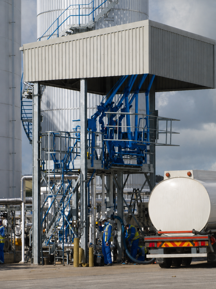 Industrial plant blue workers 720x960